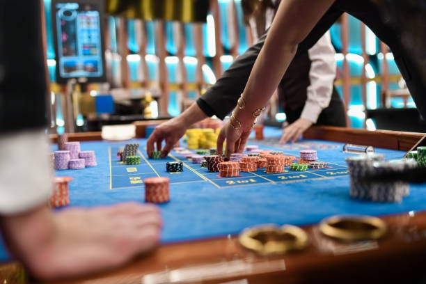 Live-dealer table interface showing blackjack and roulette options